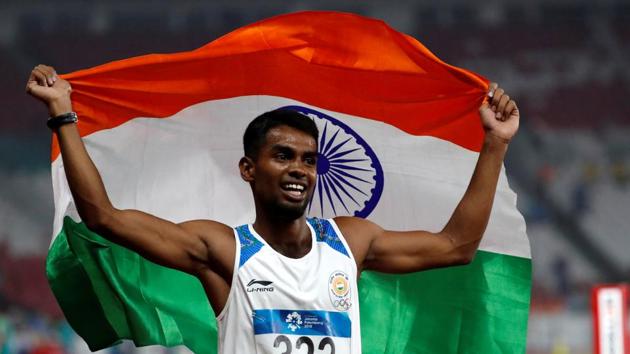 Dharun Ayyasamy of India celebrates second after the race. (REUTERS) 