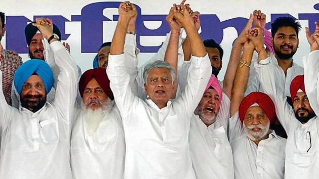 Punjab Congress president Sunil Jakhar (3L), jails minister Sukhjinder Singh Randhawa (L), technical education minister Charanjit Singh Channi (R) during the party’s political conference. (HT Photo) Punjab Congress president Sunil Jakhar (3L), jails minister Sukhjinder Singh Randhawa (L), technical education minister Charanjit Singh Channi (R) during the party’s political conference. (HT Photo)
