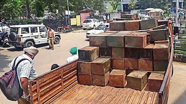 Ballot boxes being taken from the DC office for maintenance in the wake of panchayat elections in Ludhiana on Sunday.(HT Photo)