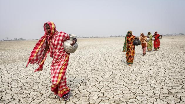 Hasina Begum(L), says god gave cursed lives to those who were born in the northern coastal areas near the Sundarbans. Annual cyclones destroy anything built in Brahmanbaria. Salinity has turned the land barren and livelihood means fishing or collecting honey from a jungle filled with predators and pirates. She lost her husband to a famished visit to the jungle five years ago. Ever since, she worries about her daughters’ futures and safety. (GMB Akash)