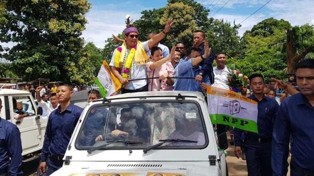 A jubilant chief minister Conrad K Sangma accompanied by his family members, supporters and party workers taking out a victory parade soon after the result to South Tura was declared. (HT Photo) A jubilant chief minister Conrad K Sangma accompanied by his family members, supporters and party workers taking out a victory parade soon after the result to South Tura was declared. (HT Photo)