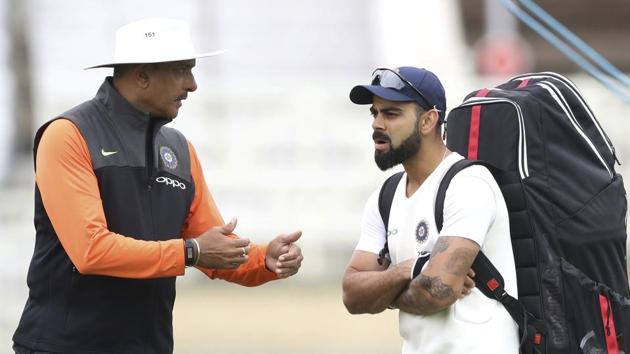 India head coach Ravi Shastri, left, speaks with Virat Kohli during the nets session.(AP)