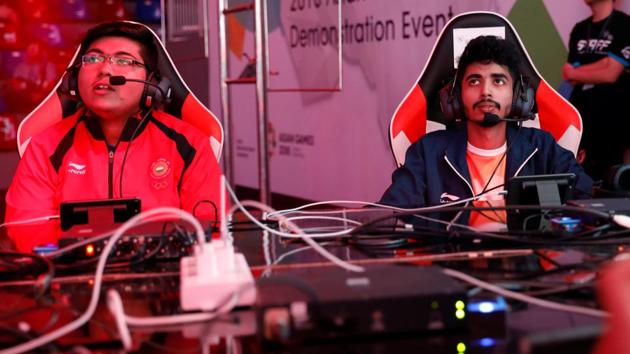 Players from India react as they watch Arena Of Valor competition at the Asian Games 2018.(REUTERS)