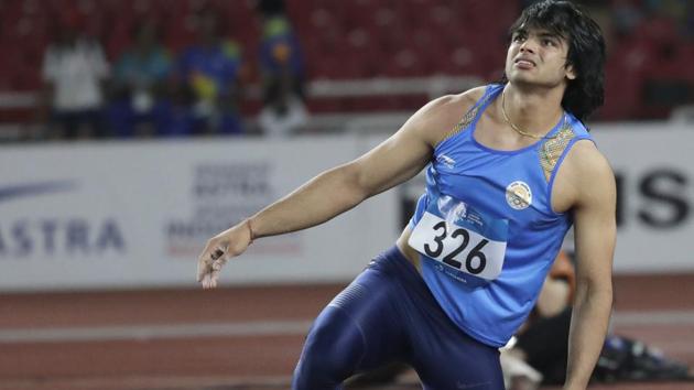 India's Neeraj Chopra watches his javelin throw in the men's final during the athletics competition. (AP) 