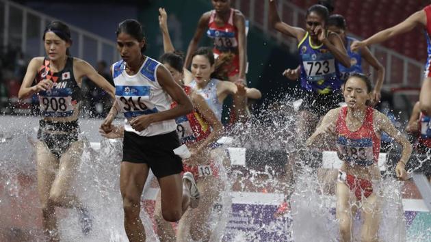 India's Sudha Singh runs in the women's 3000m steeplechase during the athletics competition. (AP) 