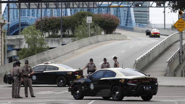 Florida Highway patrolmen block the entrance to the Main Street Bridge near the scene of a mass shooting at Jacksonville Landing in Jacksonville, Florida on Sunday.(AP) Florida Highway patrolmen block the entrance to the Main Street Bridge near the scene of a mass shooting at Jacksonville Landing in Jacksonville, Florida on Sunday.(AP)