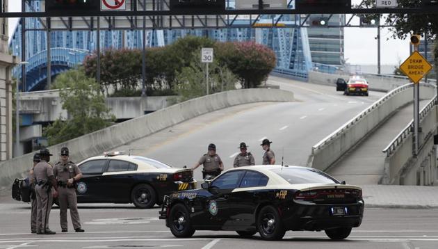 Florida Highway patrolmen block the entrance to the Main Street Bridge near the scene of a mass shooting at Jacksonville Landing in Jacksonville on August 26, 2018. (AP Photo) Florida Highway patrolmen block the entrance to the Main Street Bridge near the scene of a mass shooting at Jacksonville Landing in Jacksonville on August 26, 2018. (AP Photo)