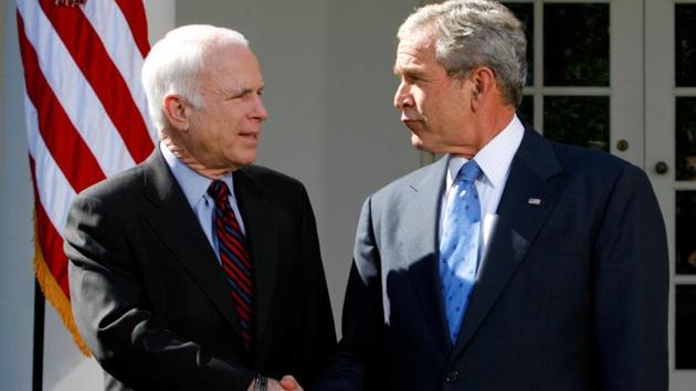 US President George W. Bush (R) and presumptive presidential nominee John McCain after a meeting at the White House on March 5, 2008. Flags flew at half-staff at the White House on Sunday. Trump tweeted his “deepest sympathies and respect” to McCain’s family. All five living former presidents - Barack Obama, George W. Bush, Bill Clinton, George H.W. Bush and Jimmy Carter - paid tribute to McCain’s courage and character. (Kevin Lamarque / REUTERS File) US President George W. Bush (R) and presumptive presidential nominee John McCain after a meeting at the White House on March 5, 2008. Flags flew at half-staff at the White House on Sunday. Trump tweeted his “deepest sympathies and respect” to McCain’s family. All five living former presidents - Barack Obama, George W. Bush, Bill Clinton, George H.W. Bush and Jimmy Carter - paid tribute to McCain’s courage and character. (Kevin Lamarque / REUTERS File)