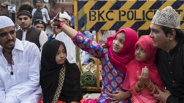 People take selfie as they gather outside Bandra station to offer Namaz on the occasion of Eid al Fitr in Mumbai, on June 16, 2018. The Muslim community in Maharashtra has decided to revive its demand for reservation in government jobs and eduction. (Satish Bate/HT Photo) People take selfie as they gather outside Bandra station to offer Namaz on the occasion of Eid al Fitr in Mumbai, on June 16, 2018. The Muslim community in Maharashtra has decided to revive its demand for reservation in government jobs and eduction. (Satish Bate/HT Photo)