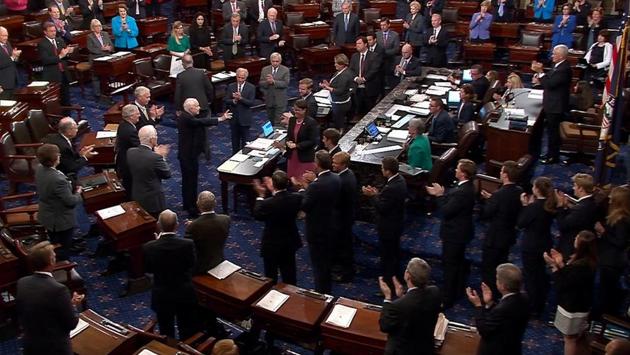 An image from video shows John McCain acknowledging applause as he arrives on the floor of the Senate for a vote on healthcare reform on July 25, 2017. Still bearing a black eye and scar from surgery, McCain gave a thumbs-down signal in a vote to scuttle a Trump-backed bill that would have repealed Obamacare and increased the number of Americans without health insurance by millions. (Senate TV / Handout via REUTERS File) An image from video shows John McCain acknowledging applause as he arrives on the floor of the Senate for a vote on healthcare reform on July 25, 2017. Still bearing a black eye and scar from surgery, McCain gave a thumbs-down signal in a vote to scuttle a Trump-backed bill that would have repealed Obamacare and increased the number of Americans without health insurance by millions. (Senate TV / Handout via REUTERS File)