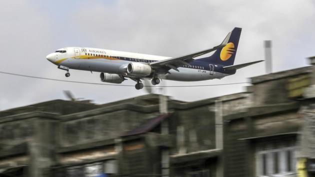 A Jet Airways aircraft prepares to land at Chhatrapati Shivaji International Airport in Mumbai. The airline’s board is meeting on Monday to discuss austerity measures and a turnaround plan. (Bloomberg) A Jet Airways aircraft prepares to land at Chhatrapati Shivaji International Airport in Mumbai. The airline’s board is meeting on Monday to discuss austerity measures and a turnaround plan. (Bloomberg)