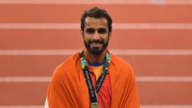 Gold medallist Manjit Singh celebrates during the victory ceremony for the men's 800m athletics event at the 2018 Asian Games in Jakarta on August 28.(AFP Photo) Gold medallist Manjit Singh celebrates during the victory ceremony for the men's 800m athletics event at the 2018 Asian Games in Jakarta on August 28.(AFP Photo)