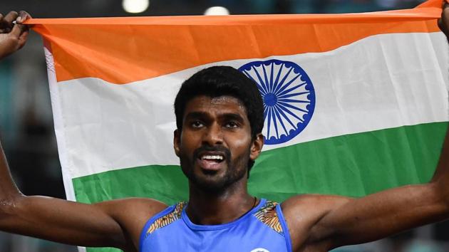 India's Jinson Johnson celebrates after the final of the men's 800m athletics event during the 2018 Asian Games. (AFP) India's Jinson Johnson celebrates after the final of the men's 800m athletics event during the 2018 Asian Games. (AFP)