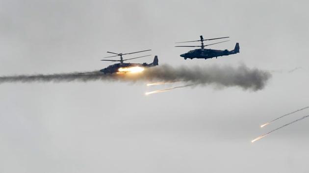 Military helicopters fire during the Zapad (West) 2017 Russia-Belarus military exercises at the Borisovsky range in Borisov, Belarus, Wednesday, Sept. 20, 2017. (AP File Photo) Military helicopters fire during the Zapad (West) 2017 Russia-Belarus military exercises at the Borisovsky range in Borisov, Belarus, Wednesday, Sept. 20, 2017. (AP File Photo)
