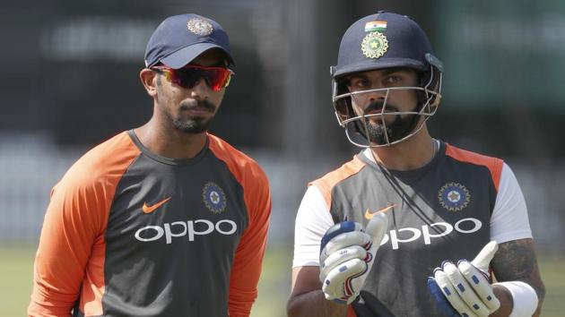 Jasprit Bumrah (left) speaks to captain Virat Kohli during a training session.(AP)