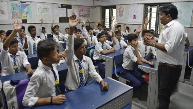 About 18,000 government teachers, including Kumar, have gone through a three-day orientation programme to learn how to teach the new curriculum. He, like all other teachers, has been provided with a ‘handbook’, which has the curriculum with clearly defined learning objectives and guiding principles. (Sanchit Khanna / HT Photo) About 18,000 government teachers, including Kumar, have gone through a three-day orientation programme to learn how to teach the new curriculum. He, like all other teachers, has been provided with a ‘handbook’, which has the curriculum with clearly defined learning objectives and guiding principles. (Sanchit Khanna / HT Photo)