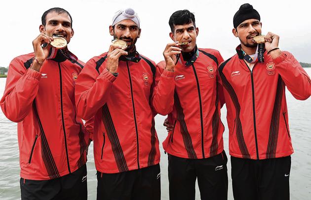 (From left) The Indian men’s team comprising Sawarn Singh, Dattu Bhokanal, Om Prakash and Sukhmeet Singh won the gold medal in the men’s quadruple sculls event. (HT Photo) (From left) The Indian men’s team comprising Sawarn Singh, Dattu Bhokanal, Om Prakash and Sukhmeet Singh won the gold medal in the men’s quadruple sculls event. (HT Photo)