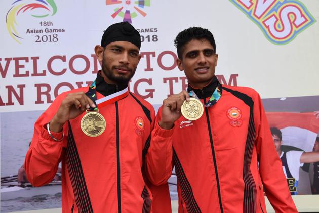 Bhagwan Das (left) and Rohit Kumar, the Indian team that bagged bronze in the lightweight double sculls rowing event after clocking 7.04.61. (HT PHOTO) Bhagwan Das (left) and Rohit Kumar, the Indian team that bagged bronze in the lightweight double sculls rowing event after clocking 7.04.61. (HT PHOTO)