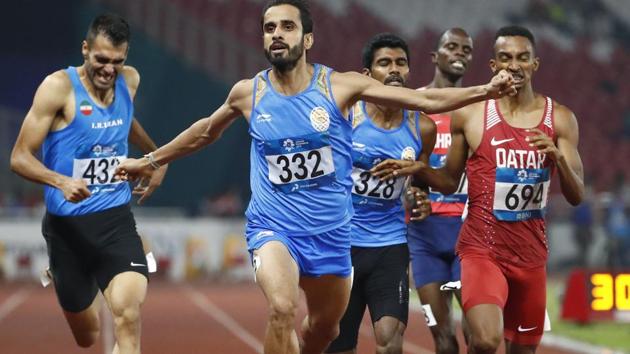 India's Manjit Singh reacts as he crosses the finish line to win the men's 800m final during the athletics competition at the 18th Asian Games. (AP) India's Manjit Singh reacts as he crosses the finish line to win the men's 800m final during the athletics competition at the 18th Asian Games. (AP)