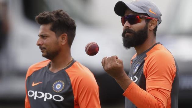India's Kuldeep Yadav, left, and Ravindra Jadeja wait to bowl during a training session at Lord's Cricket ground in London.(AP)