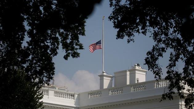 The White House flag flies at half staff in honor of Senator John McCain’s death in Washington on Monday.(Reuters Photo)