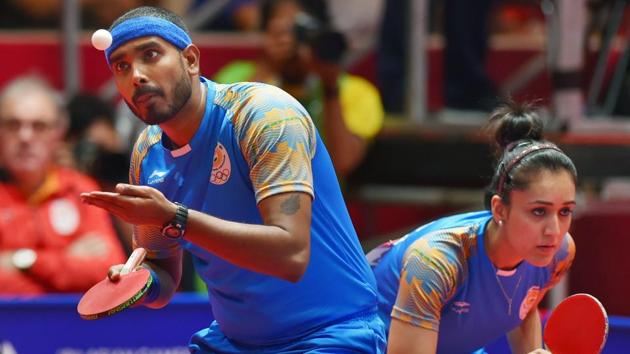 India's Achantab Sharath and Manika Batra during the mixed-double table tennis match against Korea. (PTI)