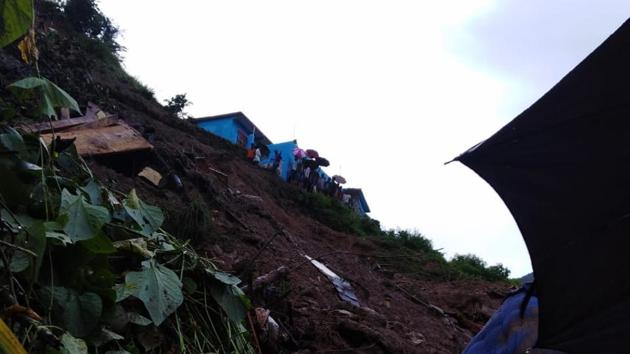 Two members of a family of seven were killed while one was rescued after their house was buried in landslide in Ghansali town of Uttarkhand and rescue operations to save them were on. (HT Photo) Two members of a family of seven were killed while one was rescued after their house was buried in landslide in Ghansali town of Uttarkhand and rescue operations to save them were on. (HT Photo)
