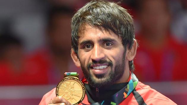 Bajrang Punia and Vinesh Phogat are in contention for the Rajiv Gandhi Khel Ratna award, the country’s highest sporting honour, after notching up gold medals in this year’s Commonwealth Games and the ongoing Asian Games 2018. (Shahbaz Khan / PTI File) Bajrang Punia and Vinesh Phogat are in contention for the Rajiv Gandhi Khel Ratna award, the country’s highest sporting honour, after notching up gold medals in this year’s Commonwealth Games and the ongoing Asian Games 2018. (Shahbaz Khan / PTI File)