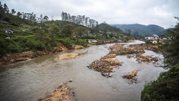 Debris from a landslide sits in a river that runs near tea estates near Munnar. The continuous rain with practically no sunshine since July has led to a severe drop in the green tea leaf crop harvest, which has already contributed to a significant loss of made tea production from the Anamallais region. (Prashanth Vishwanathan / Bloomberg) Debris from a landslide sits in a river that runs near tea estates near Munnar. The continuous rain with practically no sunshine since July has led to a severe drop in the green tea leaf crop harvest, which has already contributed to a significant loss of made tea production from the Anamallais region. (Prashanth Vishwanathan / Bloomberg)