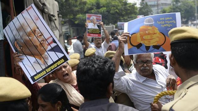 Activists of the Communist Party of India (Marxist-Leninist) New Democracy shout slogans during a protest against the arrest of poet and activist Varavara Rao in Hyderabad on August 29. (AFP Photo) Activists of the Communist Party of India (Marxist-Leninist) New Democracy shout slogans during a protest against the arrest of poet and activist Varavara Rao in Hyderabad on August 29. (AFP Photo)