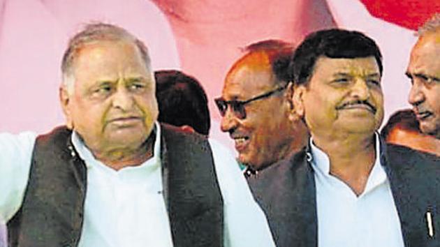 File photo of Samajwadi Party founder Mulayam Singh Yadav with his brother and senior leader Shivpal Singh Yadav in Etawah.(PTI File Photo)