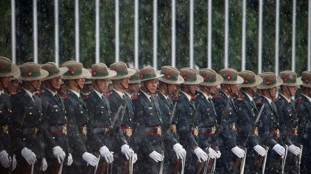 Nepalese Army personnel wait in the rain to present the guard of honour to Sri Lanka's President Maithripala Sirisena before his arrival to attend the Bay of Bengal Initiative for Multi-Sectoral Technical and Economic Cooperation (BIMSTEC) summit in Kathmandu, on Wednesday.(REUTERS) Nepalese Army personnel wait in the rain to present the guard of honour to Sri Lanka's President Maithripala Sirisena before his arrival to attend the Bay of Bengal Initiative for Multi-Sectoral Technical and Economic Cooperation (BIMSTEC) summit in Kathmandu, on Wednesday.(REUTERS)