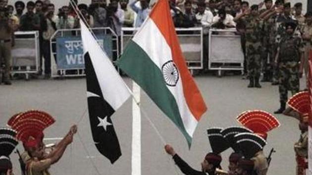 File photo of Pakistani rangers and Indian Border Security Force officers lowering their national flags during a daily parade at the Pakistan-India joint check-post at Wagah border, near Lahore. (Reuters) File photo of Pakistani rangers and Indian Border Security Force officers lowering their national flags during a daily parade at the Pakistan-India joint check-post at Wagah border, near Lahore. (Reuters)