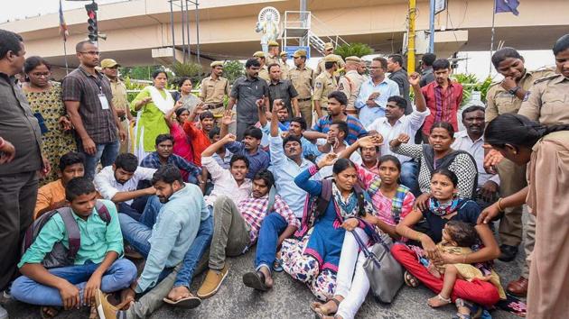 Hyderabad: Police detain activists during a protest against the arrest of revolutionary writer Varavara Rao and other activists in connection with Bhima-Koregaon violence, in Hyderabad on Wednesday.(PTI Photo)