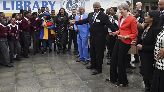 British Prime Minister Theresa May during a visit to the ID Mkhize High School in Gugulethu, Cape Town, South Africa, on Tuesday.(AP photo)