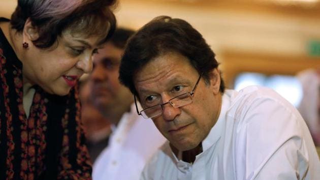 File photo of Pakistan Prime Minister Imran Khan(R) with his lawmaker Shireen Mazari.(REUTERS)