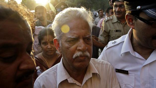 Varavara Rao, center, followed by Deepa, niece of Maoist leader Kishenji in Kolkata.(AP File Photo)