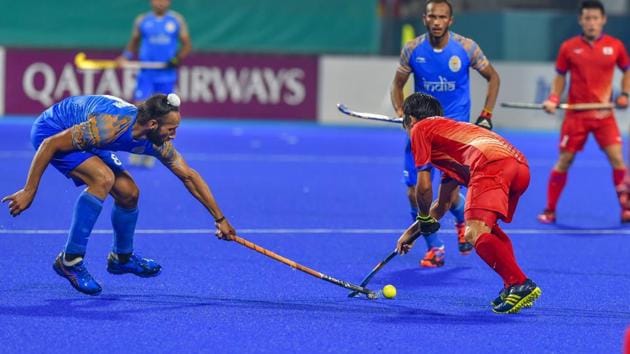 Jakarta: Indian and Japan players during their men's hockey match at the Asian Games 2018, in Jakarta on Friday, August 24, 2018. India won the match 8-0. (PTI Photo/Shahbaz Khan) (PTI8_24_2018_000234B)(PTI)