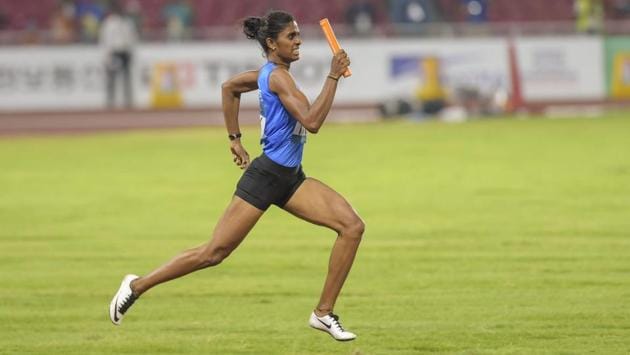 India's Poovamma Raju competes in women's 4x400m relay competition. (PTI) India's Poovamma Raju competes in women's 4x400m relay competition. (PTI)