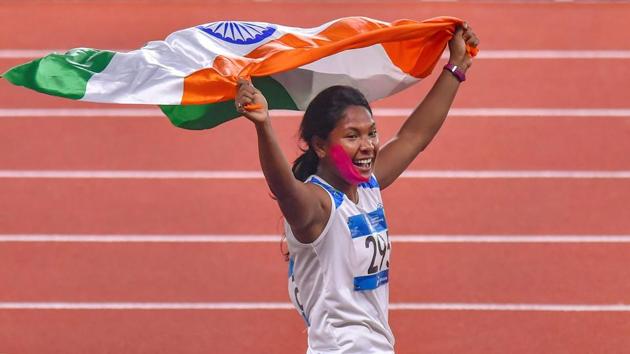 Indian athlete Swapna Barman celebrates after winning the gold medal in the women's Heptathlon event at the 18th Asian Games, in Jakarta, Indonesia on Wednesday, Aug 29, 2018.(PTI)