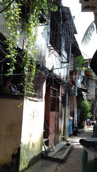 Rahat Plaza in Sion, where three committee members were recently suspended for having more than two children, is currently registered as a single society. It was originally a sprawling colonial-era chawl with 87 housing units(HT photo)