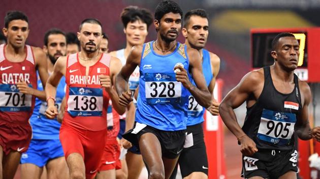 India's Jinson Johnson (C) competes in the final of the men's 1500m athletics. (AFP) India's Jinson Johnson (C) competes in the final of the men's 1500m athletics. (AFP)