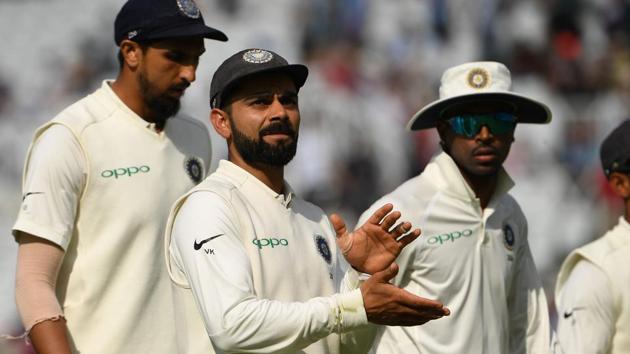 India's captain Virat Kohli (C) applauds the crowd as his team break for tea during the fourth day of the third Test cricket match between England and India at Trent Bridge in Nottingham, central England on August 21, 2018. (AFP) India's captain Virat Kohli (C) applauds the crowd as his team break for tea during the fourth day of the third Test cricket match between England and India at Trent Bridge in Nottingham, central England on August 21, 2018. (AFP)