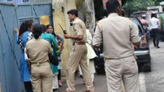 This photo taken on July 4, 2018 shows police gathered outside the premises of Mother Teresa's Missionaries of Charity where a staff member and a nun worked before their arrest on child trafficking charges in Ranchi in India's eastern Jharkhand state. (AFP Representative Photo) This photo taken on July 4, 2018 shows police gathered outside the premises of Mother Teresa's Missionaries of Charity where a staff member and a nun worked before their arrest on child trafficking charges in Ranchi in India's eastern Jharkhand state. (AFP Representative Photo)