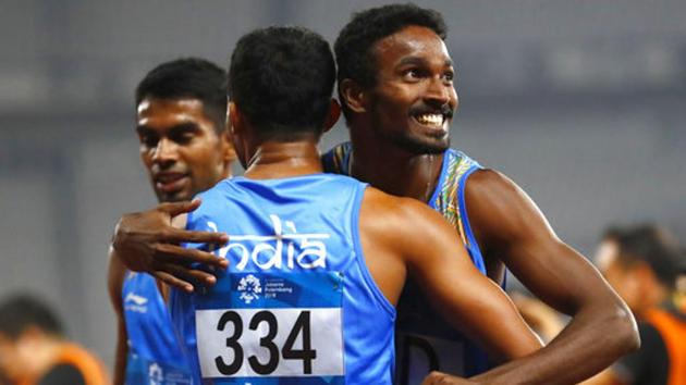 India's men's 4x400m relay team celebrate after their second place finish during the athletics competition. (AP) India's men's 4x400m relay team celebrate after their second place finish during the athletics competition. (AP)