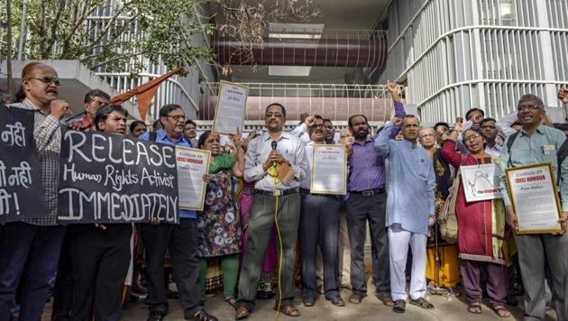Activists protest the arrest of five intellectuals, in Pune on Thursday. (PTI) Activists protest the arrest of five intellectuals, in Pune on Thursday. (PTI)