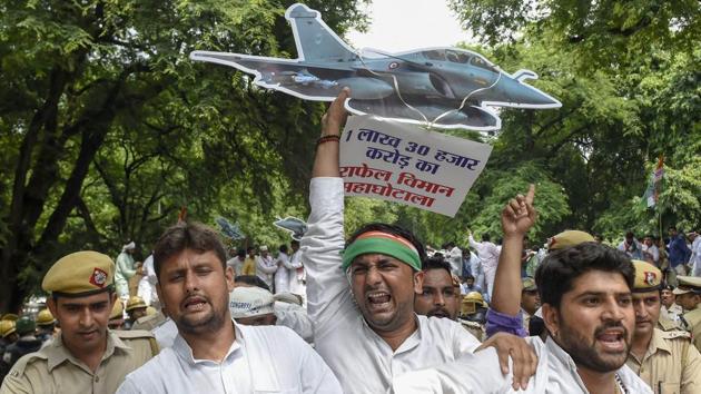 Police detain Indian Youth Congress (IYC) members during a protest against Rafale deal scam, at Akbar Road in New Delhi on Thursday, Aug 30, 2018. (PTI) Police detain Indian Youth Congress (IYC) members during a protest against Rafale deal scam, at Akbar Road in New Delhi on Thursday, Aug 30, 2018. (PTI)