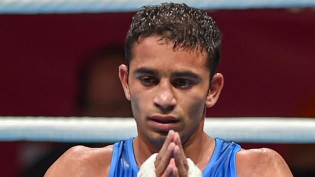 Jakarta: India's Amit Panghal gestures after he was declared winner against Paalam Carlo. (PTI) Jakarta: India's Amit Panghal gestures after he was declared winner against Paalam Carlo. (PTI)