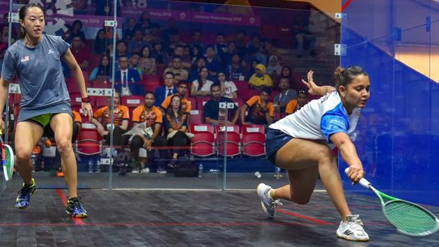 India's Dipika Pallikal Karthik (R) in action during women's squash semifinal match against Malaysia. (PTI) India's Dipika Pallikal Karthik (R) in action during women's squash semifinal match against Malaysia. (PTI)
