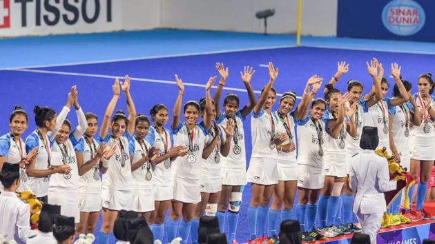 Jakarta: Silver medal winning Indian women's hockey team celebrates during the medal ceremony at the 18th Asian Games 2018, in Jakarta, Indonesia on Friday, Aug 31, 2018. (PTI Photo/Vijay Verma) (PTI8_31_2018_000191B)(PTI)